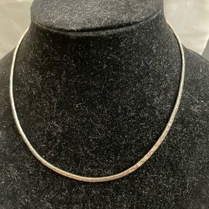 Hammered sterling silver torc.